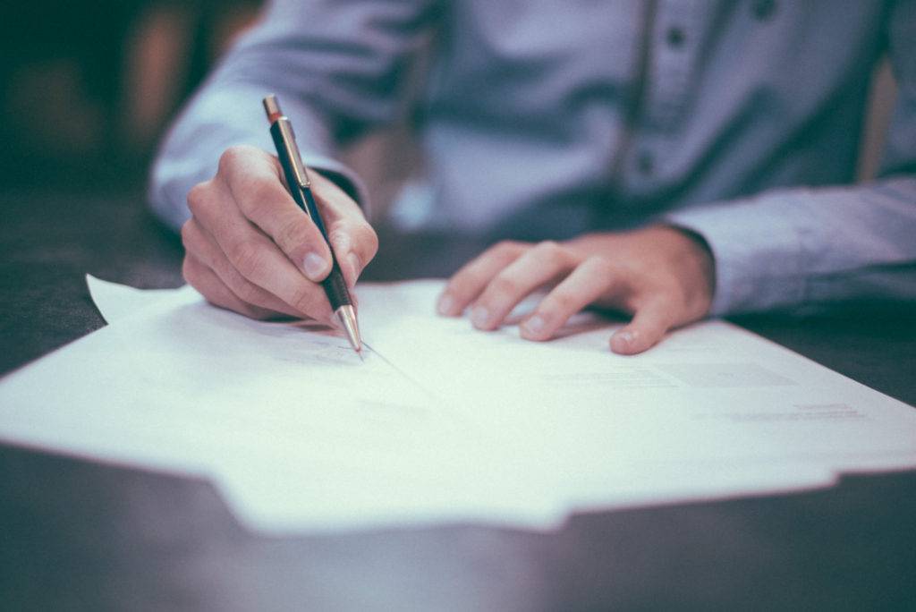 Man editing documents