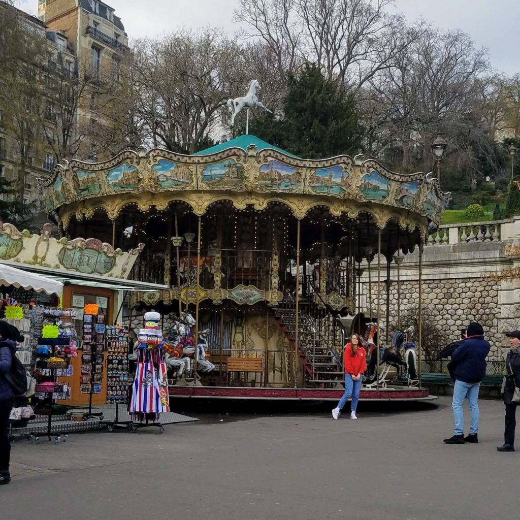 Ornate two-story carousel in Montmartre, Paris