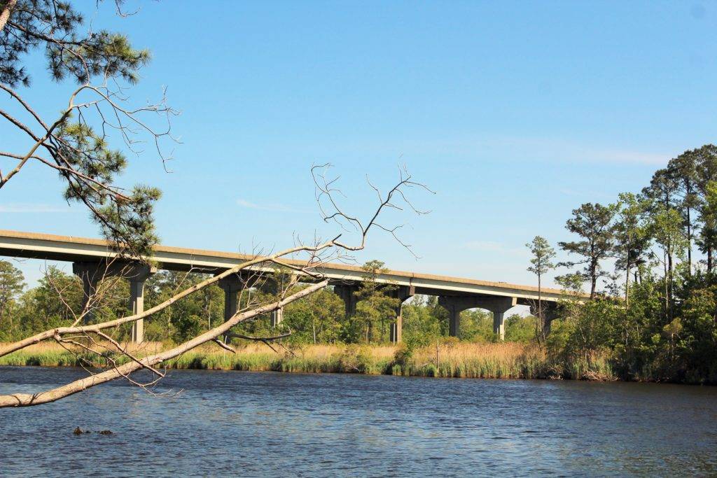 a modern bridge extending across a waterway