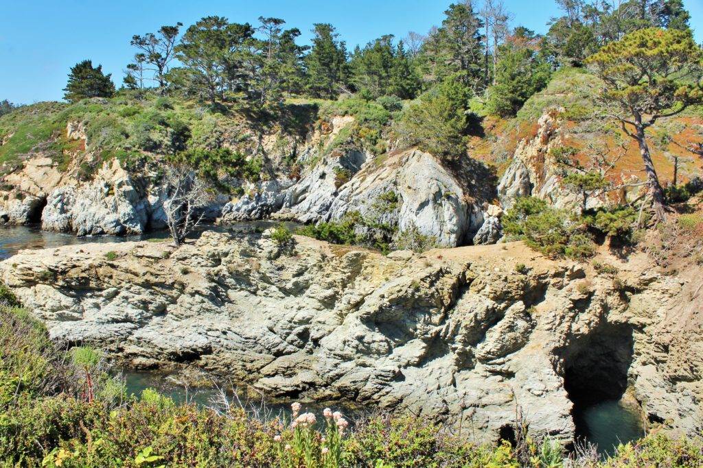 rocky cliff-faces and islands with a cave at Point Lobos 