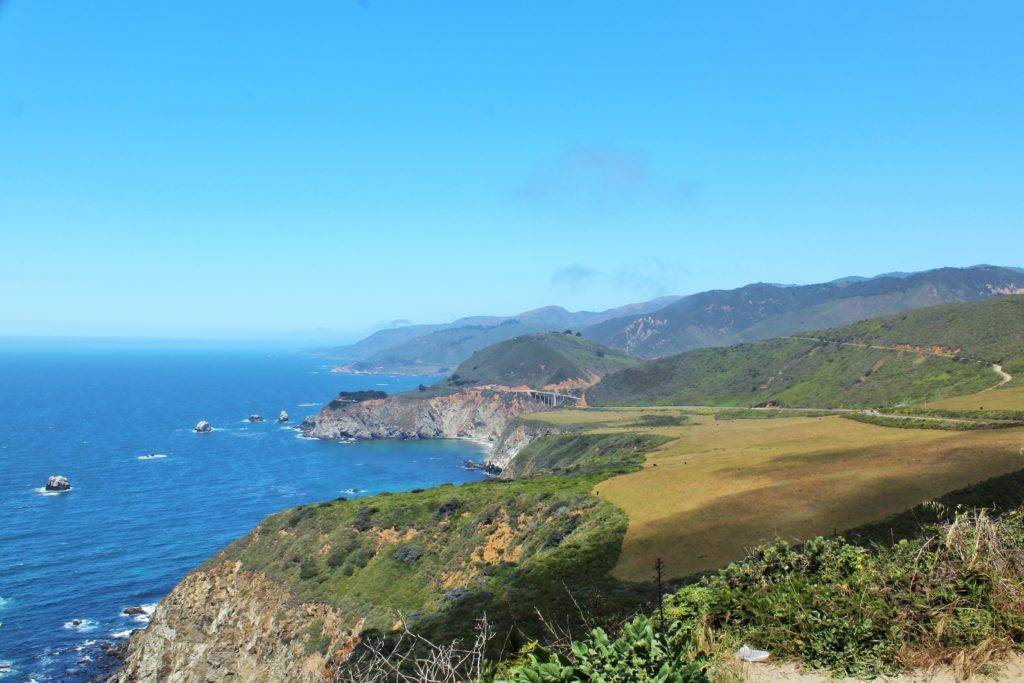 Hurricane Point on Hwy 1 showing Bixby Bridge to the North and blue sea and sky