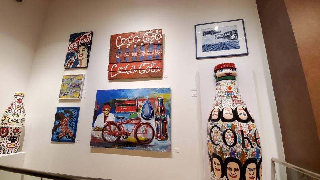Various art pieces on the them of Coca-Cola