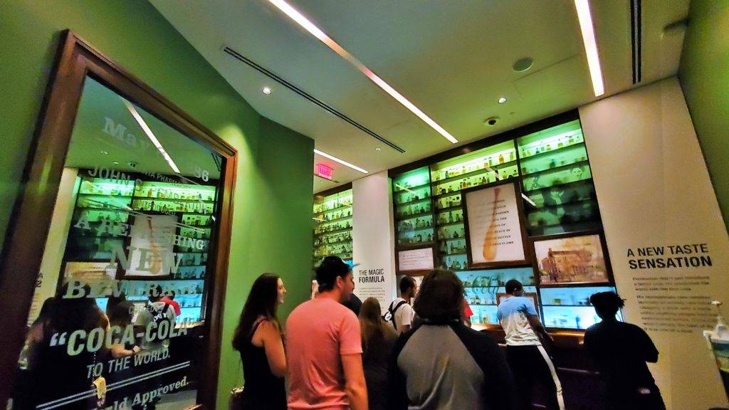 Apothecary-style room with green-tinted lighting