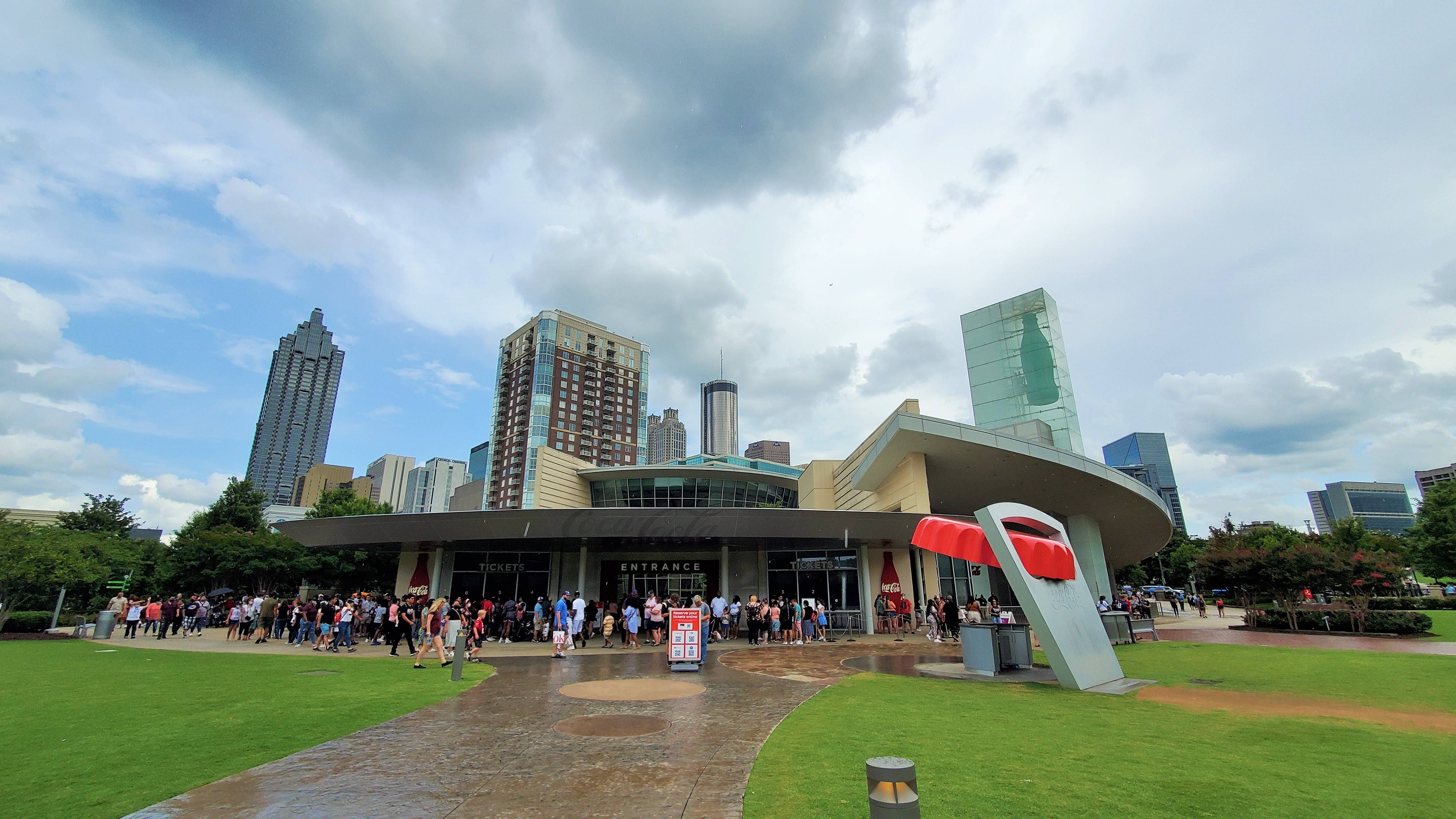 Low building beneath the Atlanta skyline housing the World of Coca-Cola