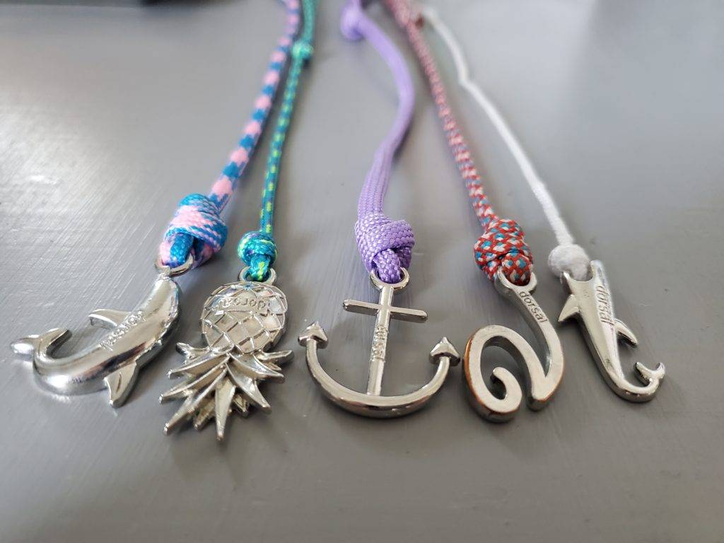 collection of multi-colored, ocean-themed bracelets
