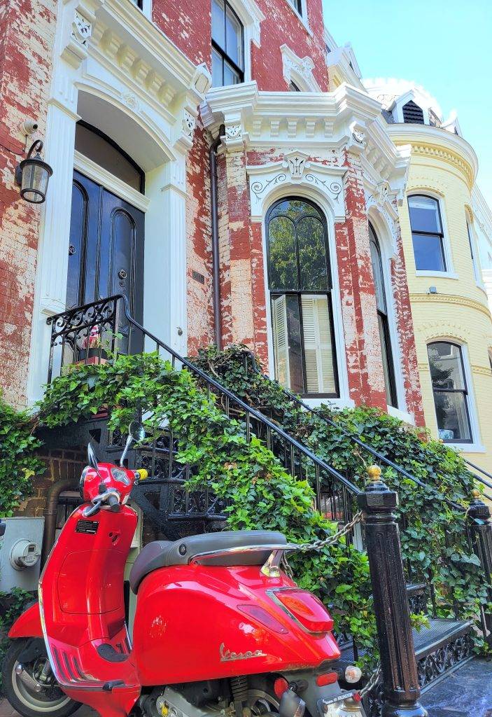 row house with red vespa in Georgetown DC