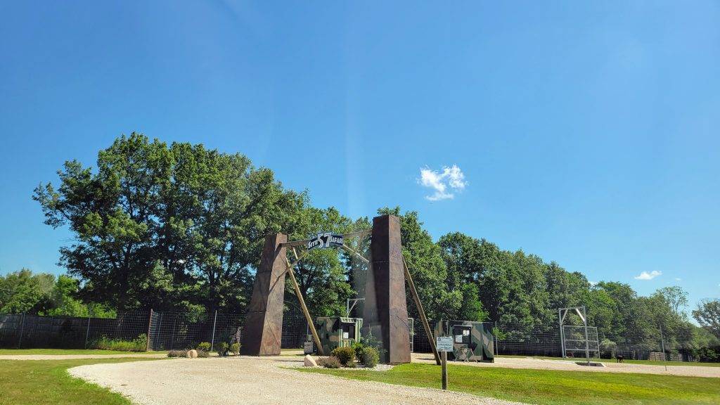 stone archway leading to a drive-thru safari