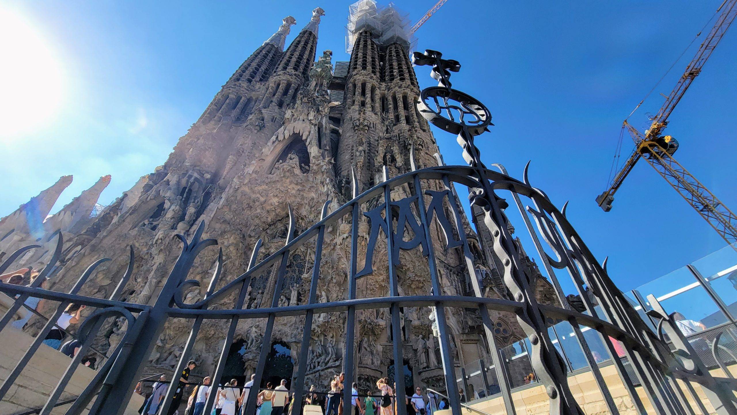 The Nativity Facade of La Sagrada Familia against a blue sky