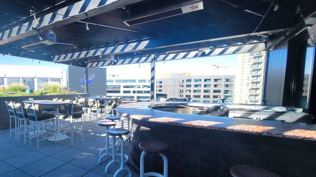 The bar of the Red Barber on the Catbird Hotel rooftop