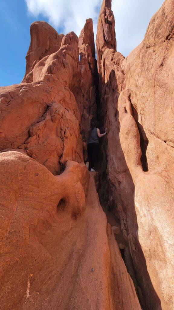 Large rock crevice in a red rock formation at Garden of the Gods in Colorado Springs