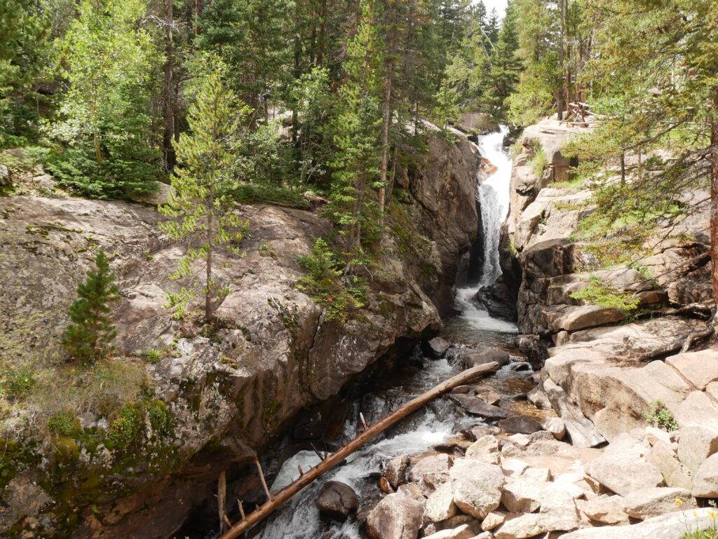 mountain waterfall in a rocky gorge rocky mountain national park