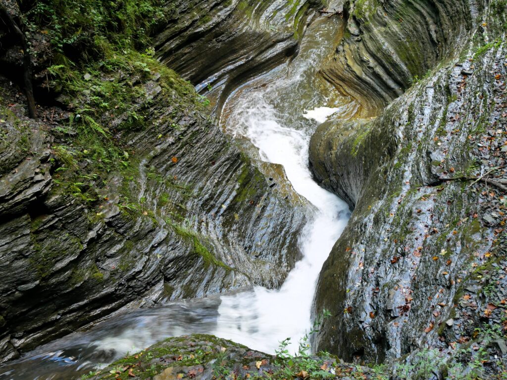 creek rushing through layered rock at Watkins Glen State Park