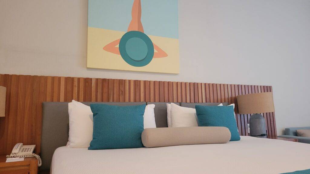 King-size bed in a Deluxe Room at the Viva Maya