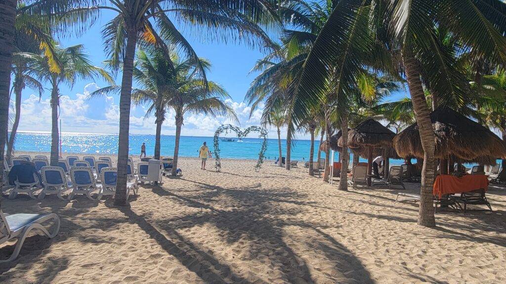 quiet beach and blue waters at Viva Maya