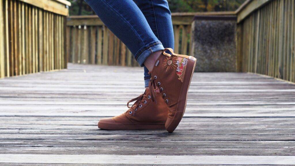 BANGS sneakers on a rustic boardwalk